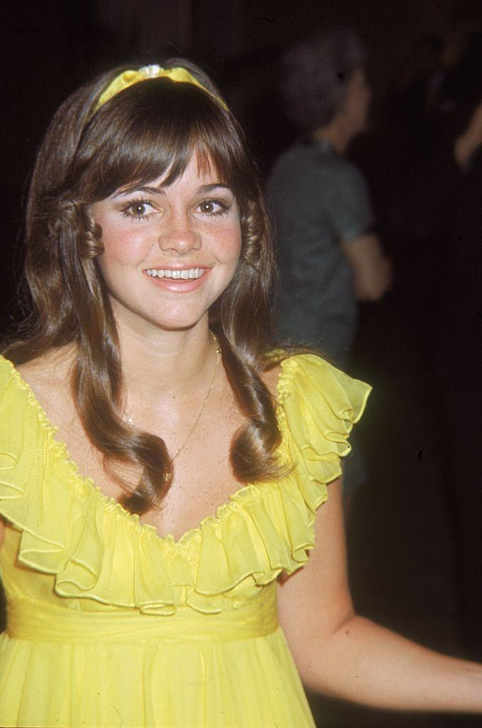 #14 Sally Field in a sleeveless yellow dress, 1968