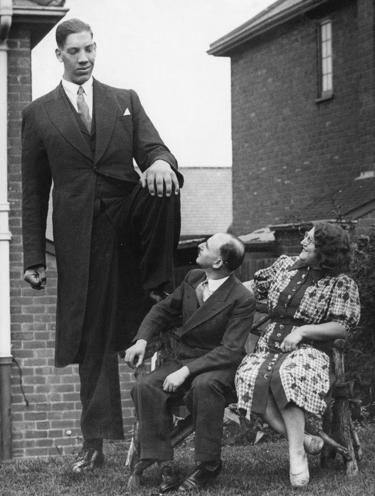 #34 Vaino Myllyrinne the world’s tallest man who’s height is recorded at 8 feet 3 inches is seen here attending the wedding of Pat Collins in Birmingham, 1939.