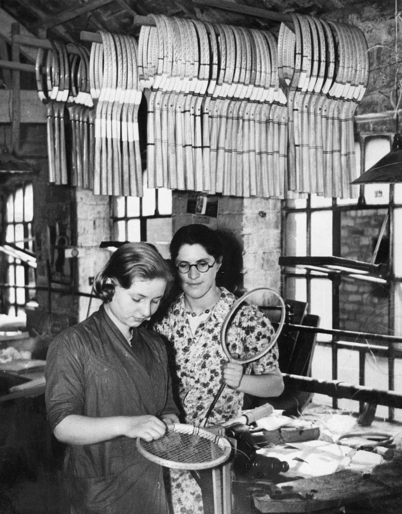 #28 Tennis rackets being strung at the Birmingham factory of Messers Clapshaw and Cleave Limited, 1939.