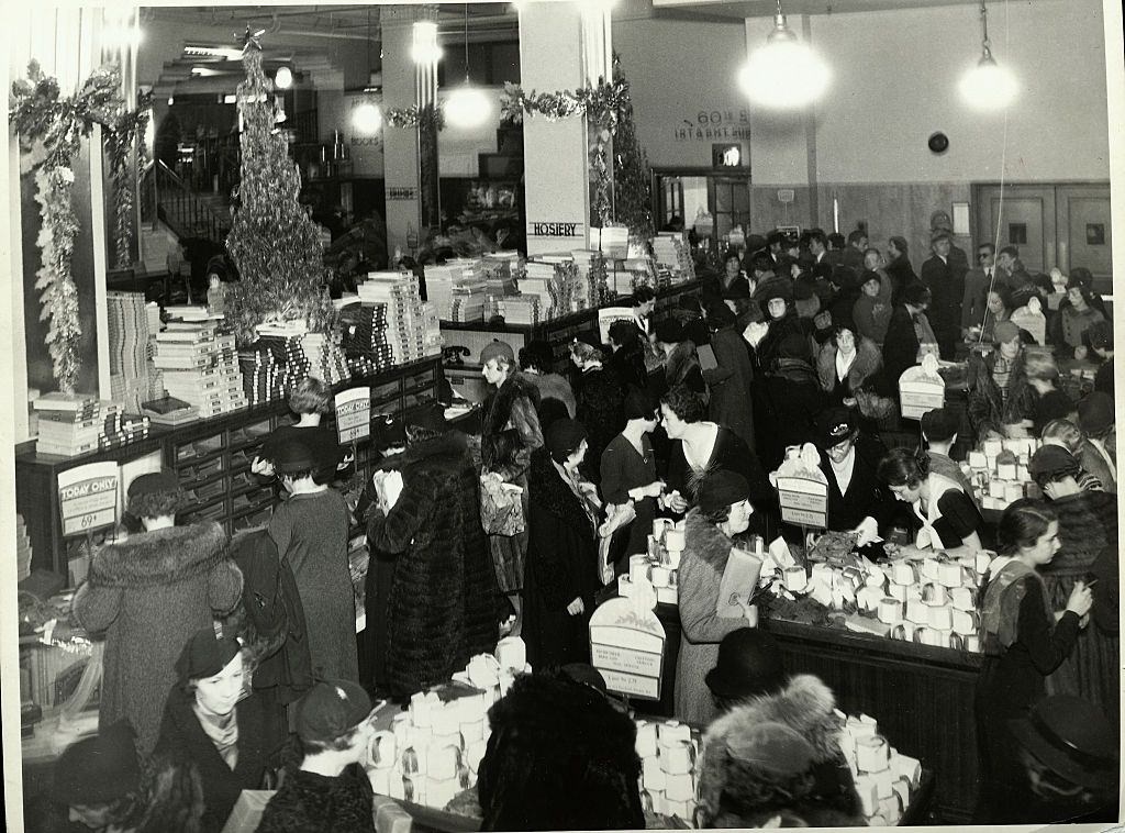 #38 Shoppers in a New York City department store, 1930s.