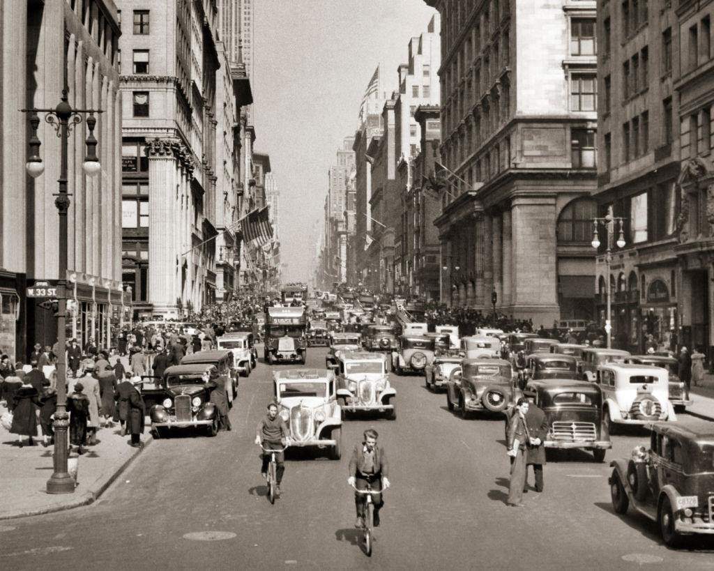 #11 Two way automobile traffic on fifth avenue at 33rd street, Manhattan, NYC, 1930s.