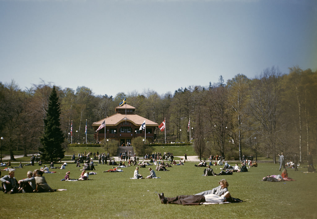 #12 People in Slottsskogen (“Castle Forest”) in Gothenburg. The building is the Large Restaurant from 1906, more known as Björngårdsvillan (The Bear-Garden Villa), 1948