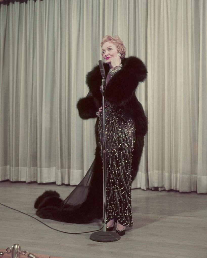 #14 Marlene Dietric performing on stage in Las Vegas, 1953.