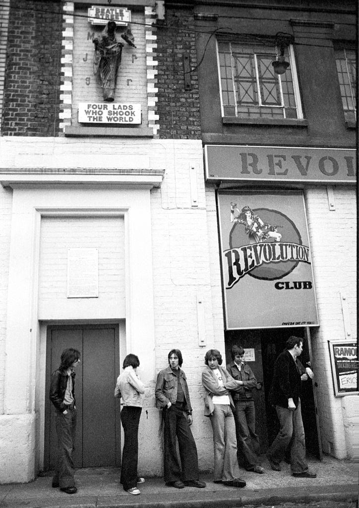 #37 Fans queue up outside a Ramones gig at the punk club Eric’s at the Revolution Club on Matthew Street in Liverpool, 1977.