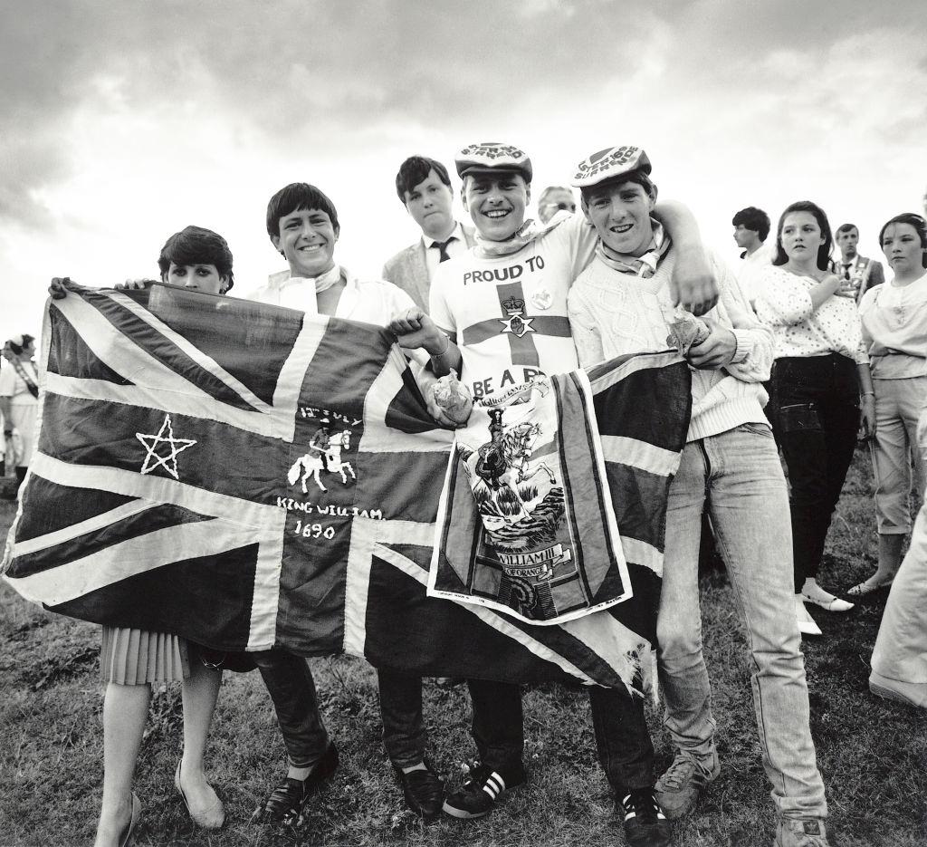 #55 Young men with their flag during the annual Orange Order march in Liverpool