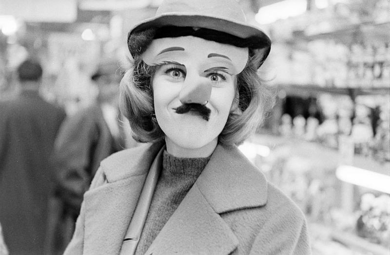 #15 Jane Fonda put on a mask with moustache and a long nose in a drugstore.