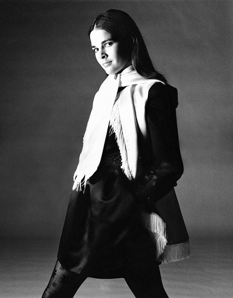 #17 Ali MacGraw in a black satin mini shirtdress, Vogue 1969.