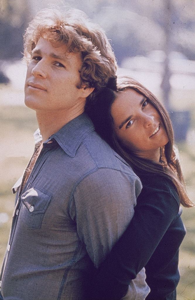 #19 Ali MacGraw with Ryan O’Neal during the making of ‘Love Story’, 1969.