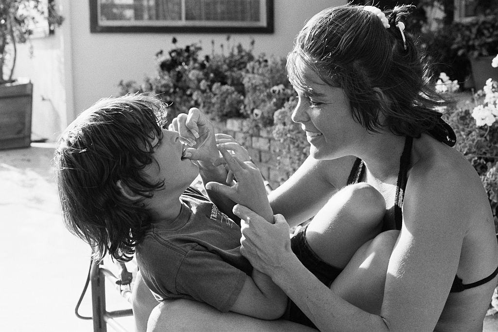 #36 Ali MacGraw with her son Josh Evans, 1978.