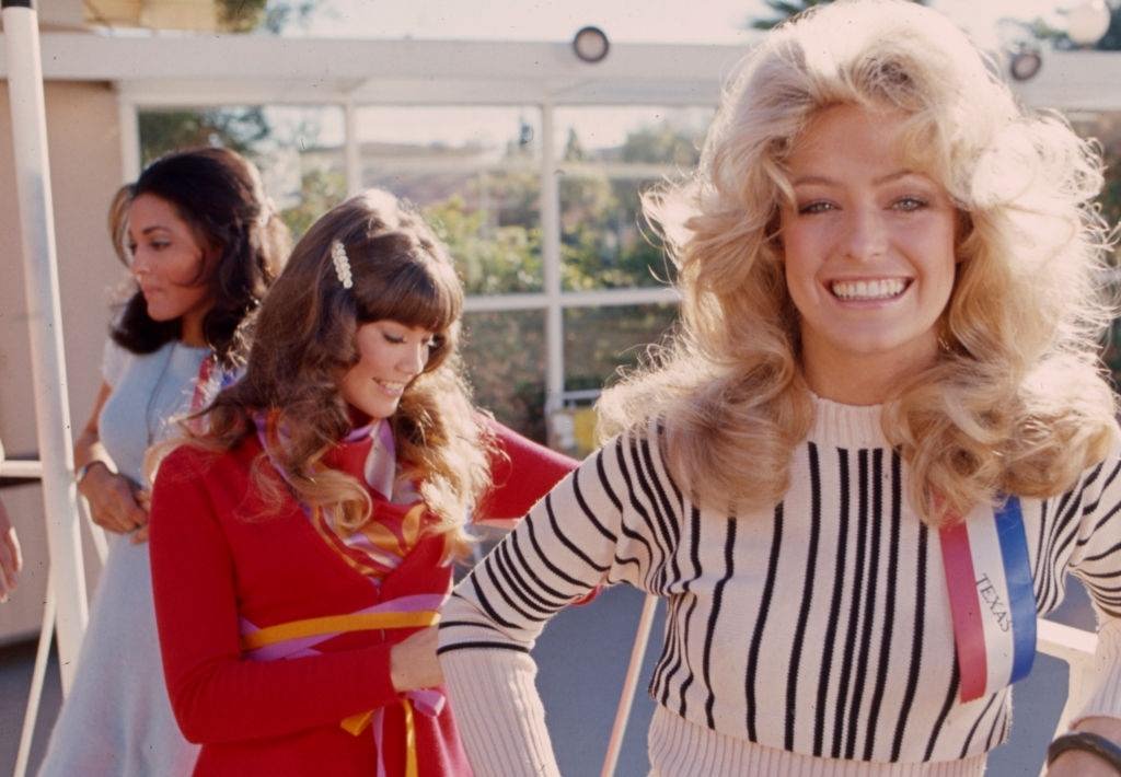 #56 Barbi Benton with Tracy Reed and Farrah Fawcet, in ‘The Great American Beauty Contest’, 1973.