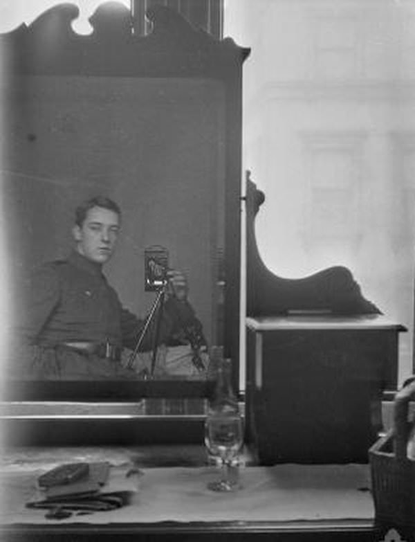 #9 Australian soldier and pilot Thomas Baker takes a dresser mirror selfie, 1917.