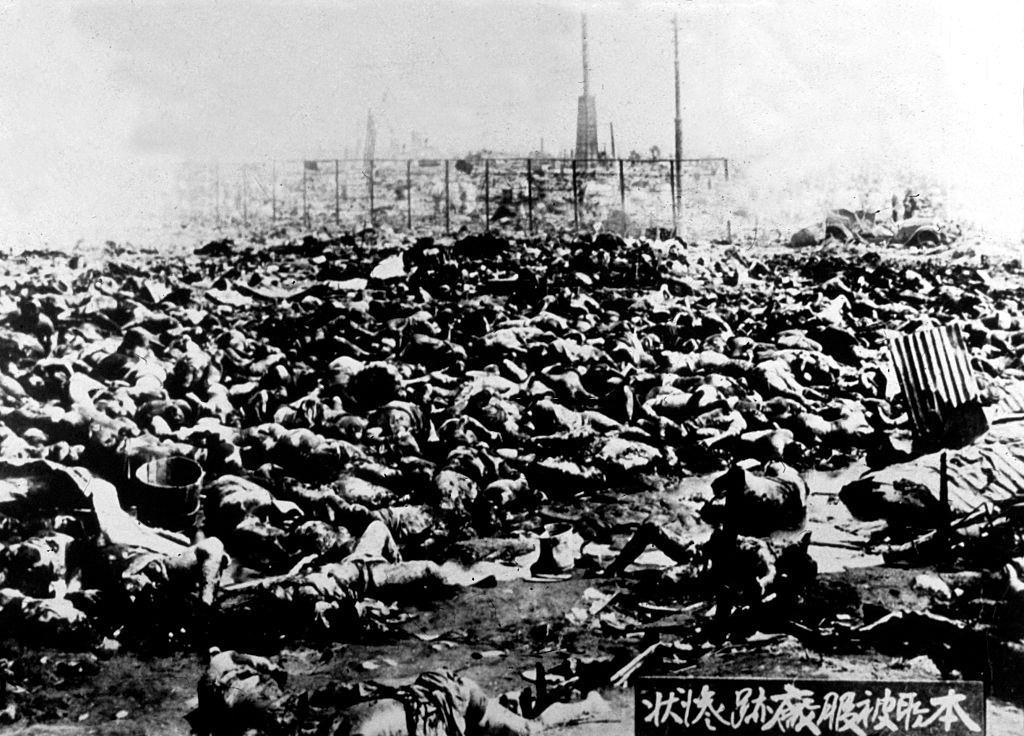 #46 Bodies outside the Rikugun Honjo Hifukusho (the former Army Clothing Depot) in downtown Tokyo. Around 38,000 people were burned to death in the depot, having taken shelter there from the earthquake.