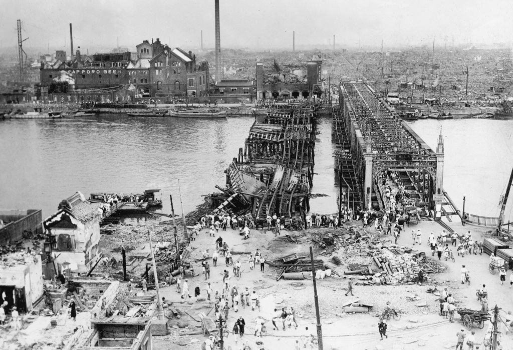 #1 High-angle view of the area around the Azuma Bridge, which crosses the Sumida River, and the Honjo District, 1923.