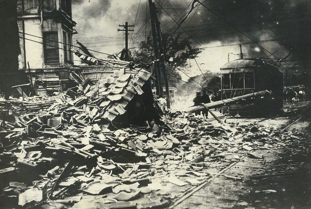 #25 Destroyed building debris blocks the track of the tram after the Great Kanto Earthquake at Tsukiji crossing in September 1923.