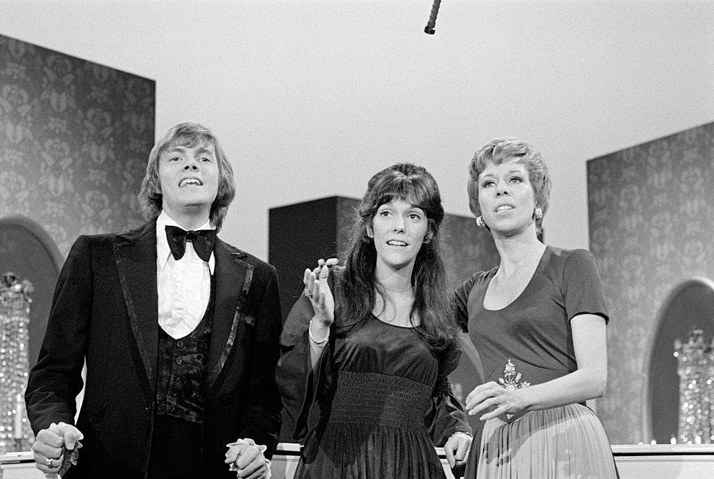 Karen Carpenter and Richard Carpenter with actress Carol Burnett in comedy &; variety program ‘The Carol Burnett Show,’ 1972.
