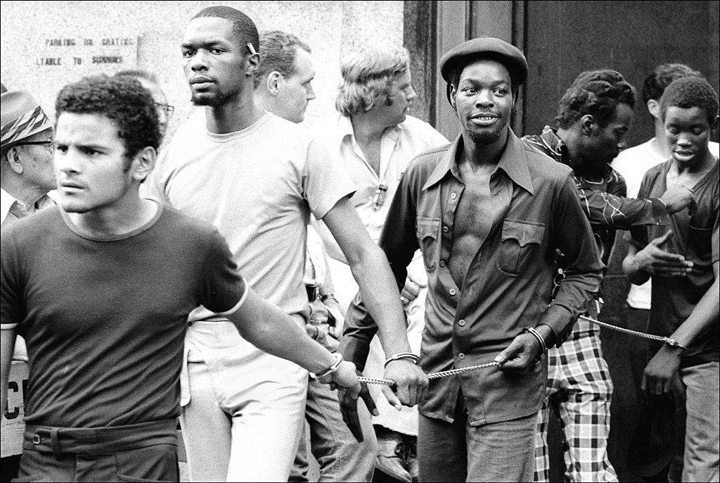 #12 Handcuffed men who were arrested for looting during the blackout, New York City, 1977.