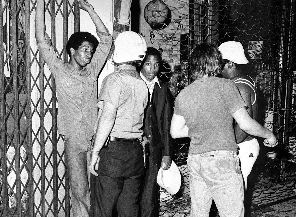 #29 Cops contain suspected looters at Grand Concourse and Fordham Road in the Bronx, New York City, 1977.