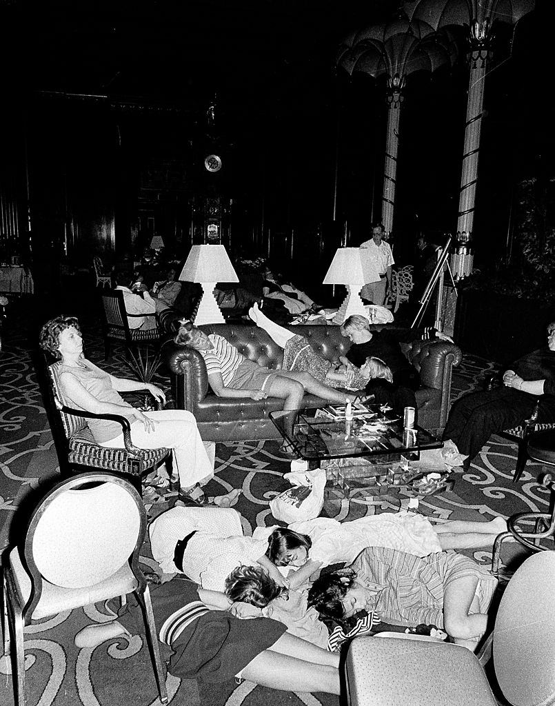 #9 Stranded people sleeping in the lobby at the Waldorf-Astoria hotel, New York City, July 13, 1977.