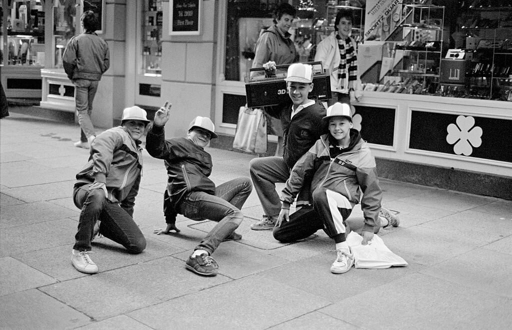 #30 A young group of B Boy kids posing in the street with a boombox, Guernsey, 1986
