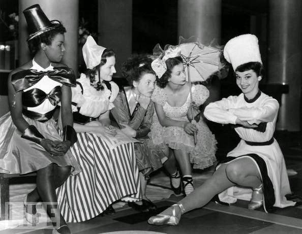 #22 Audrey Hepburn with the cast of a Christmas Party, 1949.