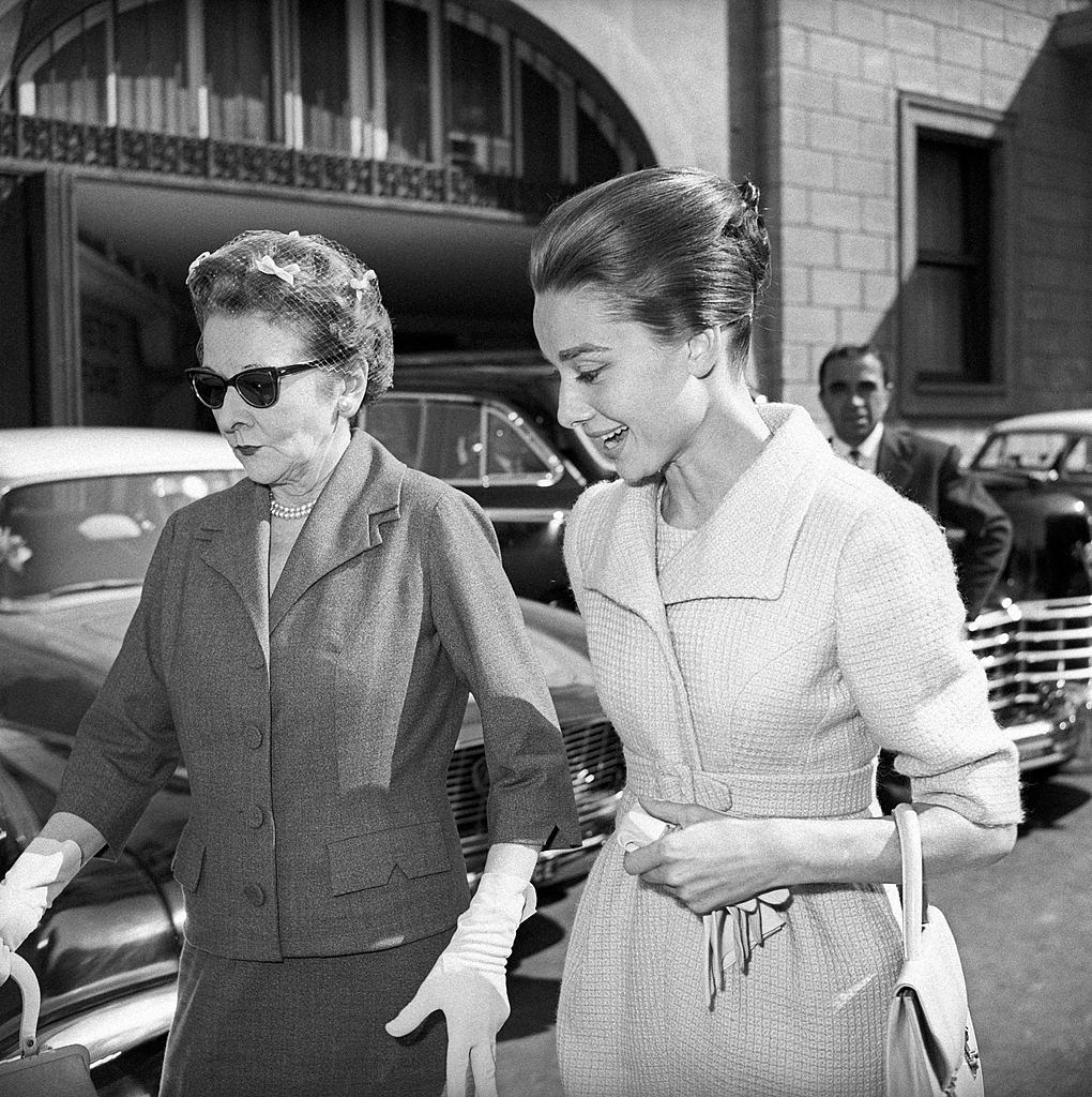 #44 Audrey Hepburn walking with her mother, the Dutch baroness Ella Van Heemstra. Rome, 1950s.