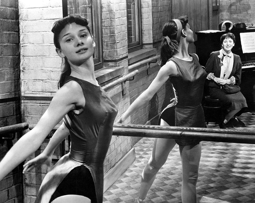 #45 Audrey Hepburn rehearsing at the barre, 1950.