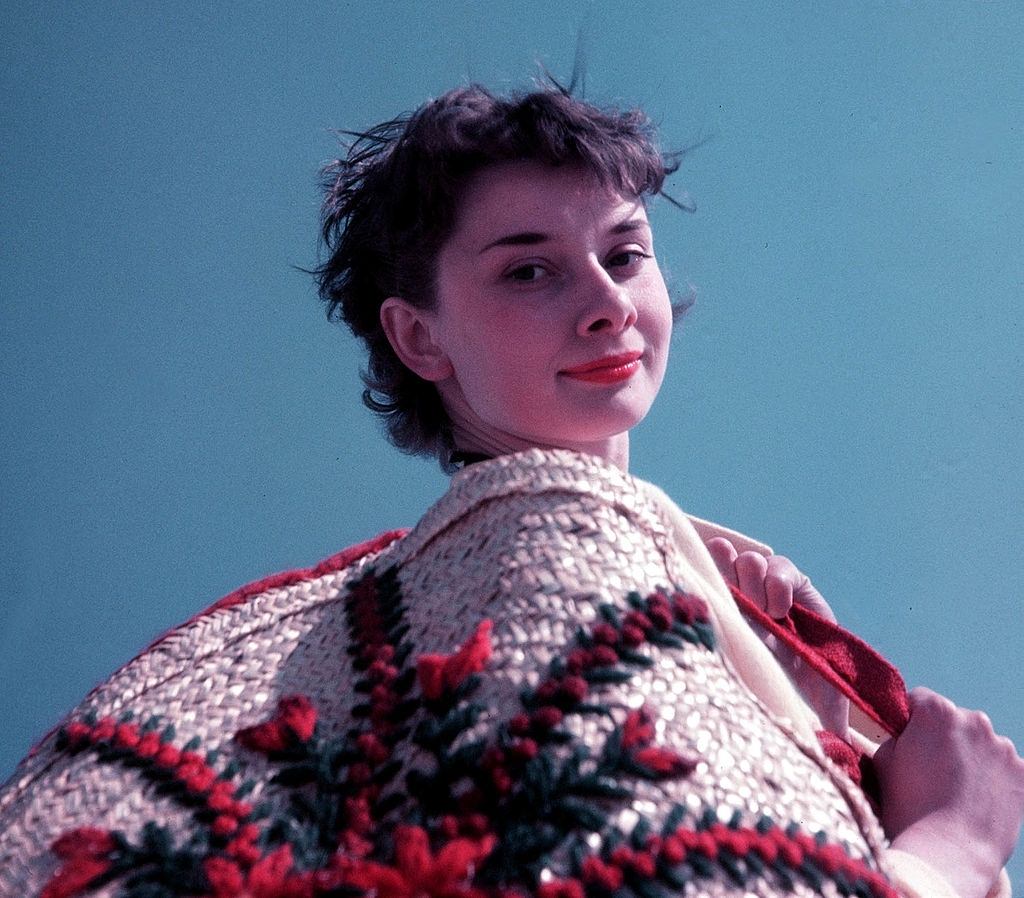 #59 Audrey Hepburn, relaxing by the coast, 1951.
