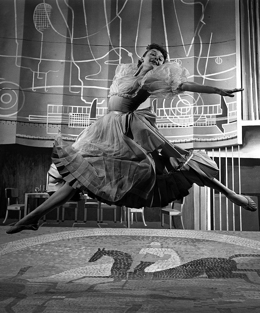#62 Audrey Hepburn dancing on the set of the film “The Secret People”