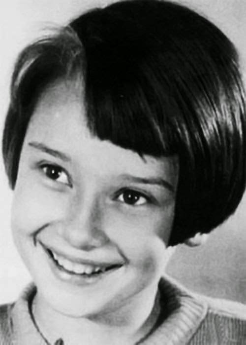 #7 A young Audrey Hepburn, 1939. Photograph by Manon van Suchtelen.