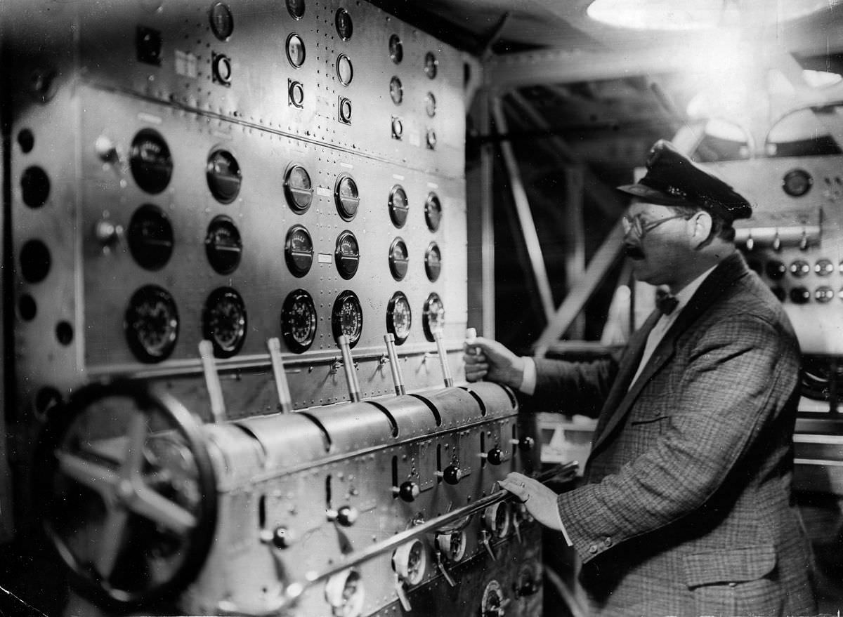 #5 A machinist in the flying boat’s engine room,July 25, 1929