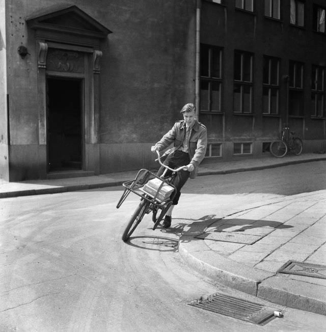 #12 A bicycle messenger on his way.