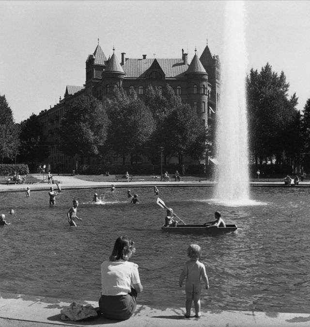 #13 Children swimming in Karlaplan’s fountain.