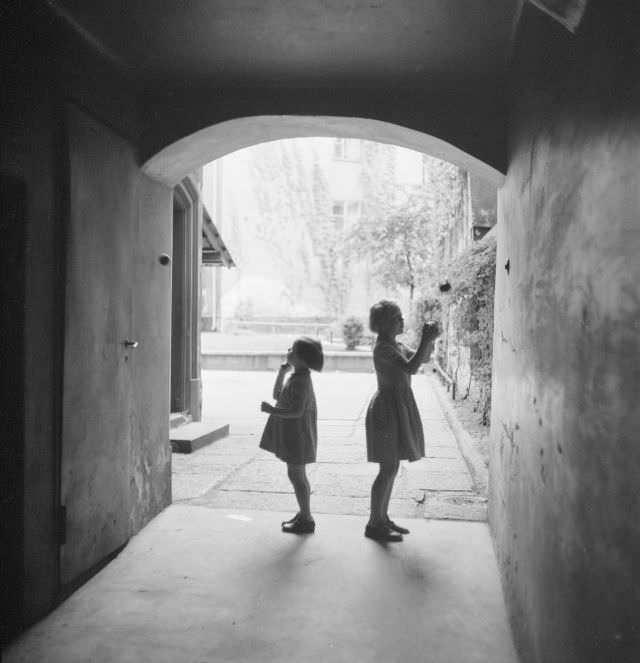 #32 Two little girls throwing balls in a vault in Cepheus neighborhood, Gamla stan.