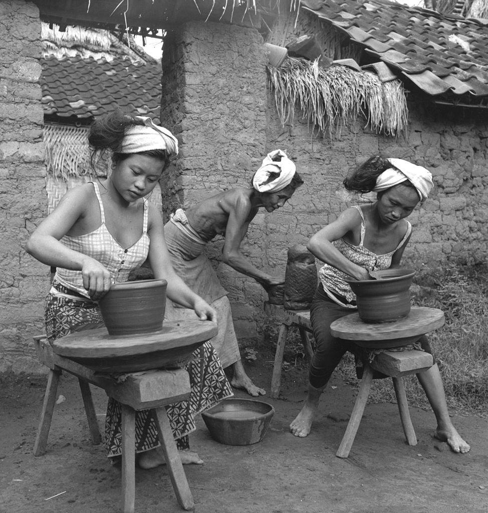 #37 Women turning pots by hand in Bali, 1954.