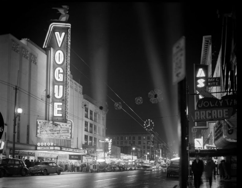 #40 Vogue Theatre at night with spotlights, Vancouver, 1958