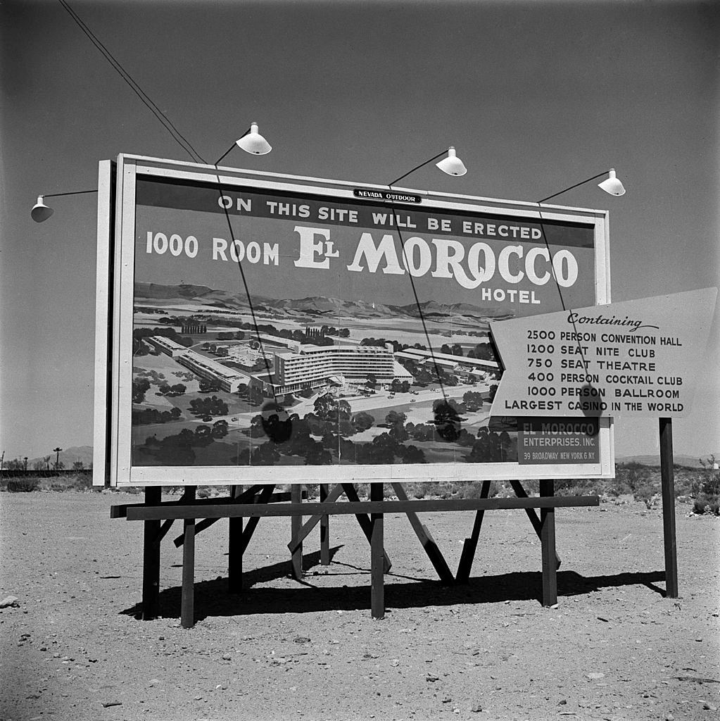 #60 A sign for future location of the El Morocco casino and hotel in Las Vegas desert, 1960.