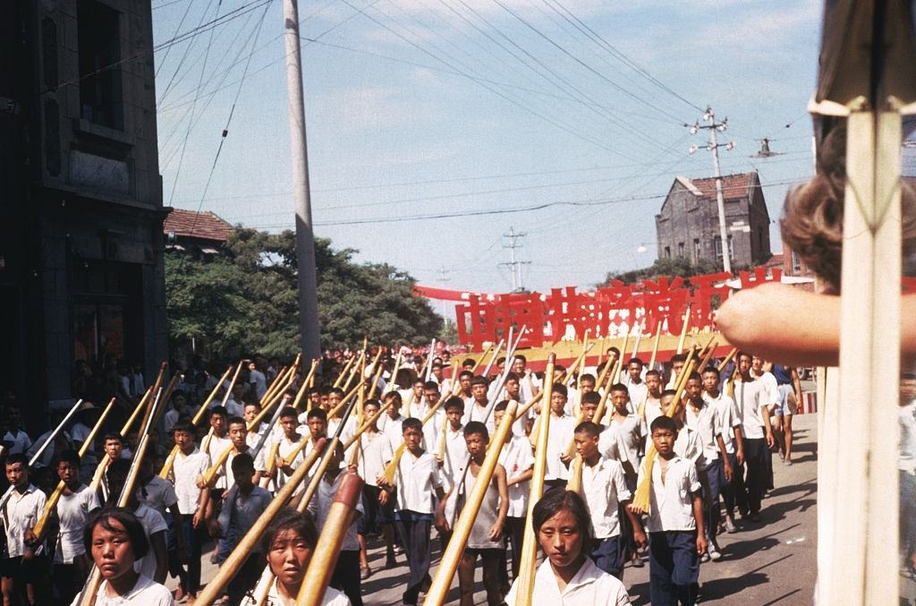 #35 Young Red Guards march with wooden rifles.