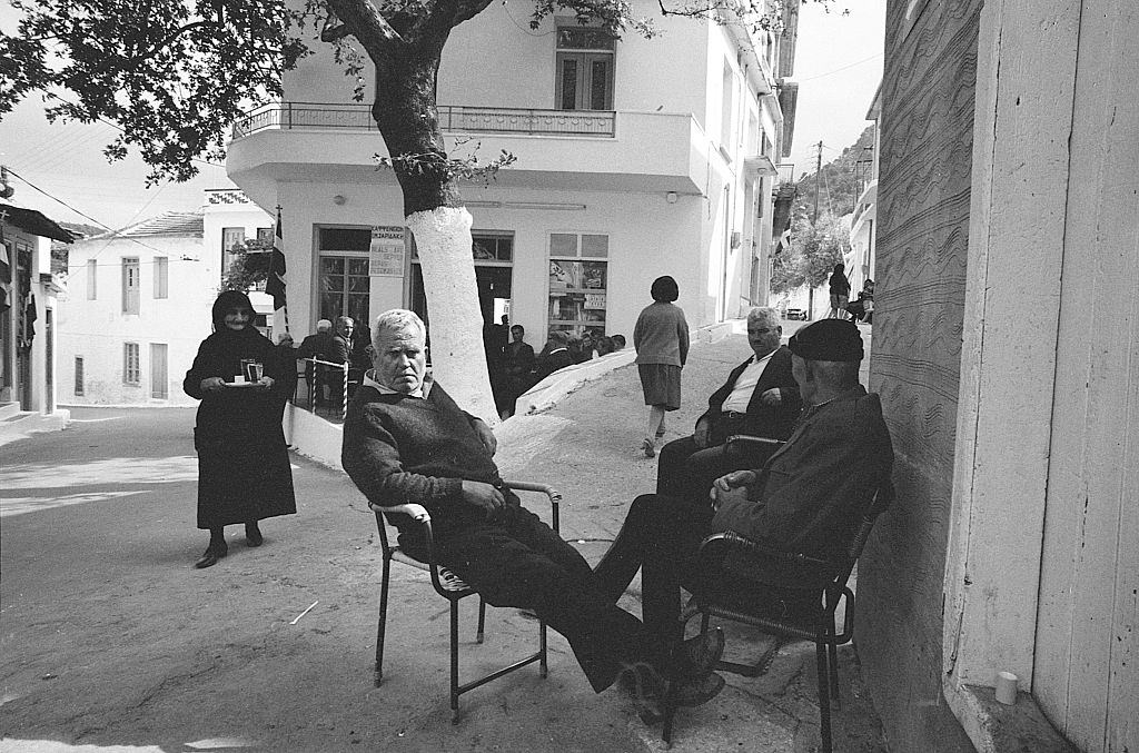 #9 Men sitting outside a cafe. Greece, 1970s