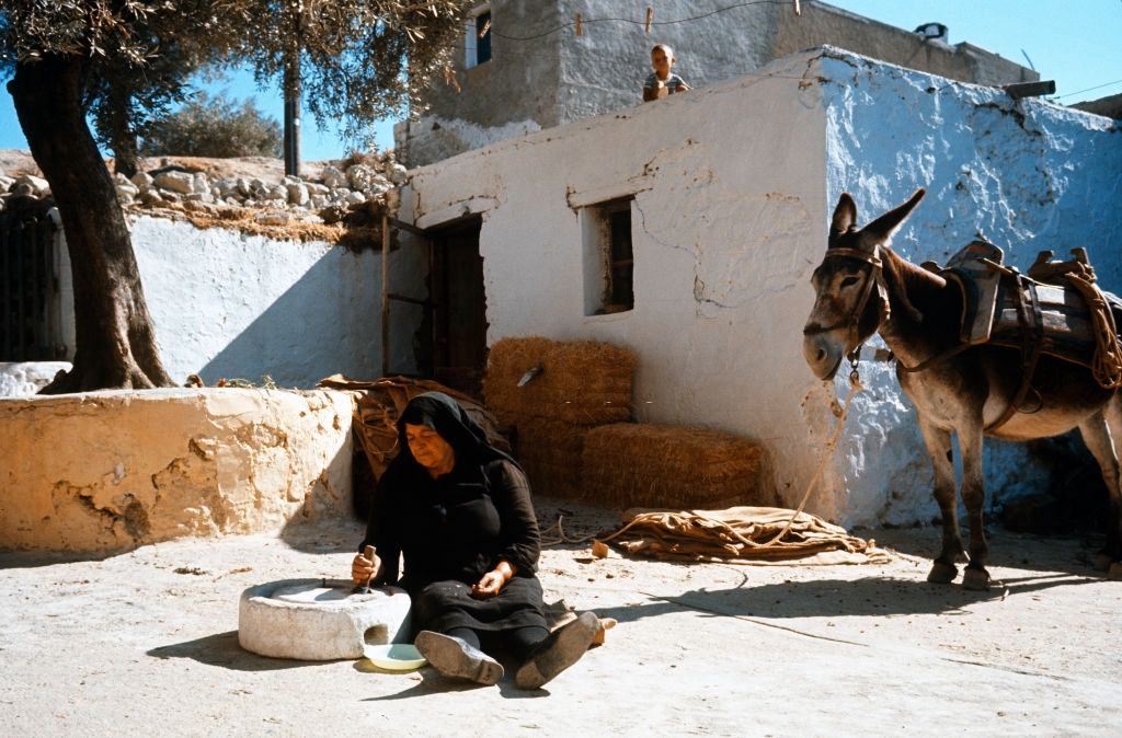 #19 A woman Crinding corn, Zaros, Greece, 1970.