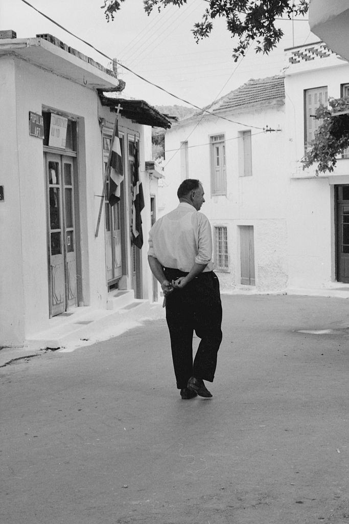 #10 A man walking in the street. Greece, 1970s