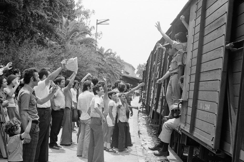 #50 Departure of the recalled at Athens station after the fall of the colonel regime on July 20, 1974, Greece.