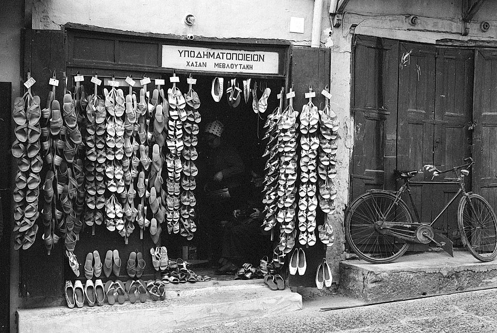 #14 A shoe shop in a Greek island. Greece, 1970s