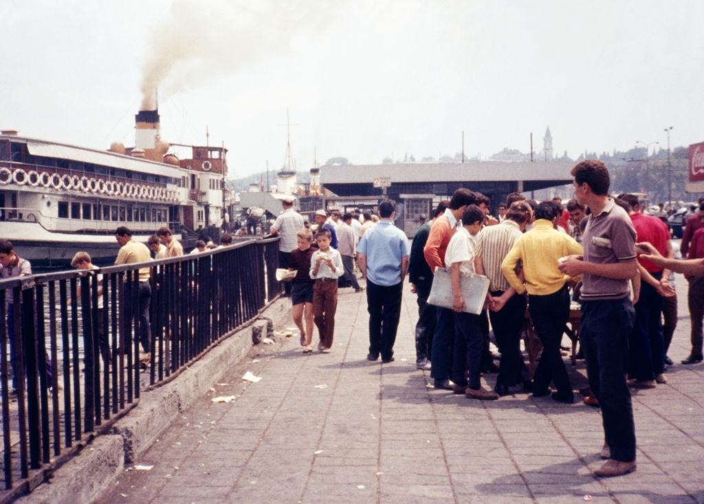 #4 Crowds of tourists and locals gather near Galata Bridge, Istanbul, 1970.