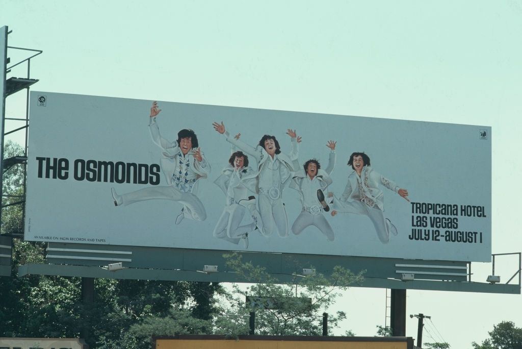 #3 A hoarding advertising an appearance by The Osmonds at the Tropicana Hotel in Las Vegas from July to August 1974.