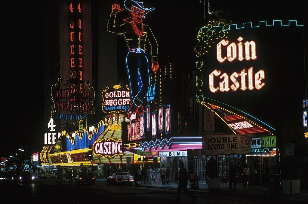 #11 Coin Castle, a waving cowboy sign, and the Golden Nugget hotel in Las Vegas, March 1975.