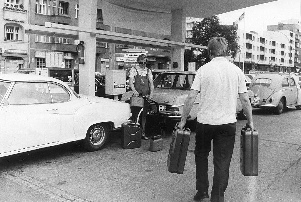#29 Gasoline hamster purchases at petrol station in Berlin, July 1973.