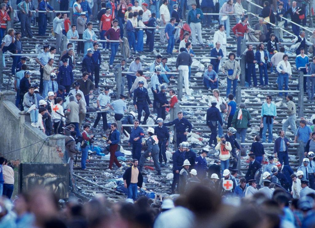 #40 The aftermath of the crowd riots before the start of the European Cup Final between Juventus and Liverpool at the Heysel Stadium, Brussels, May 1985.