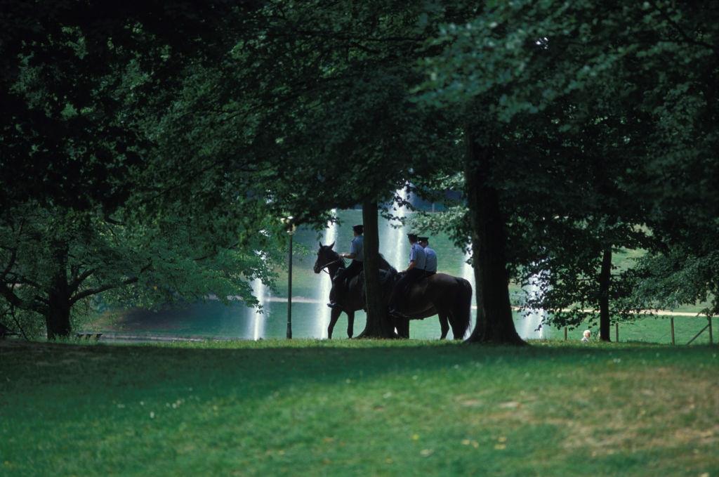 #5 Policemen riding on the horses in the Bois de Cambre in Brussels in August 1986.