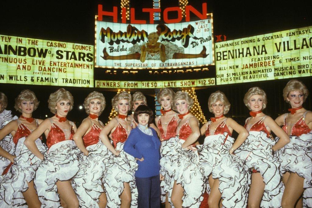 #53 Mireille Mathieu with Jacki Clerico and his wife and the Moulin Rouge troupe in Las Vegas, 1982.