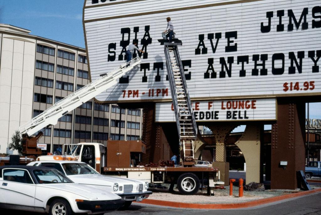 #35 Change of letters announcing a show on the pediment of a casino in Las Vegas, 1982.